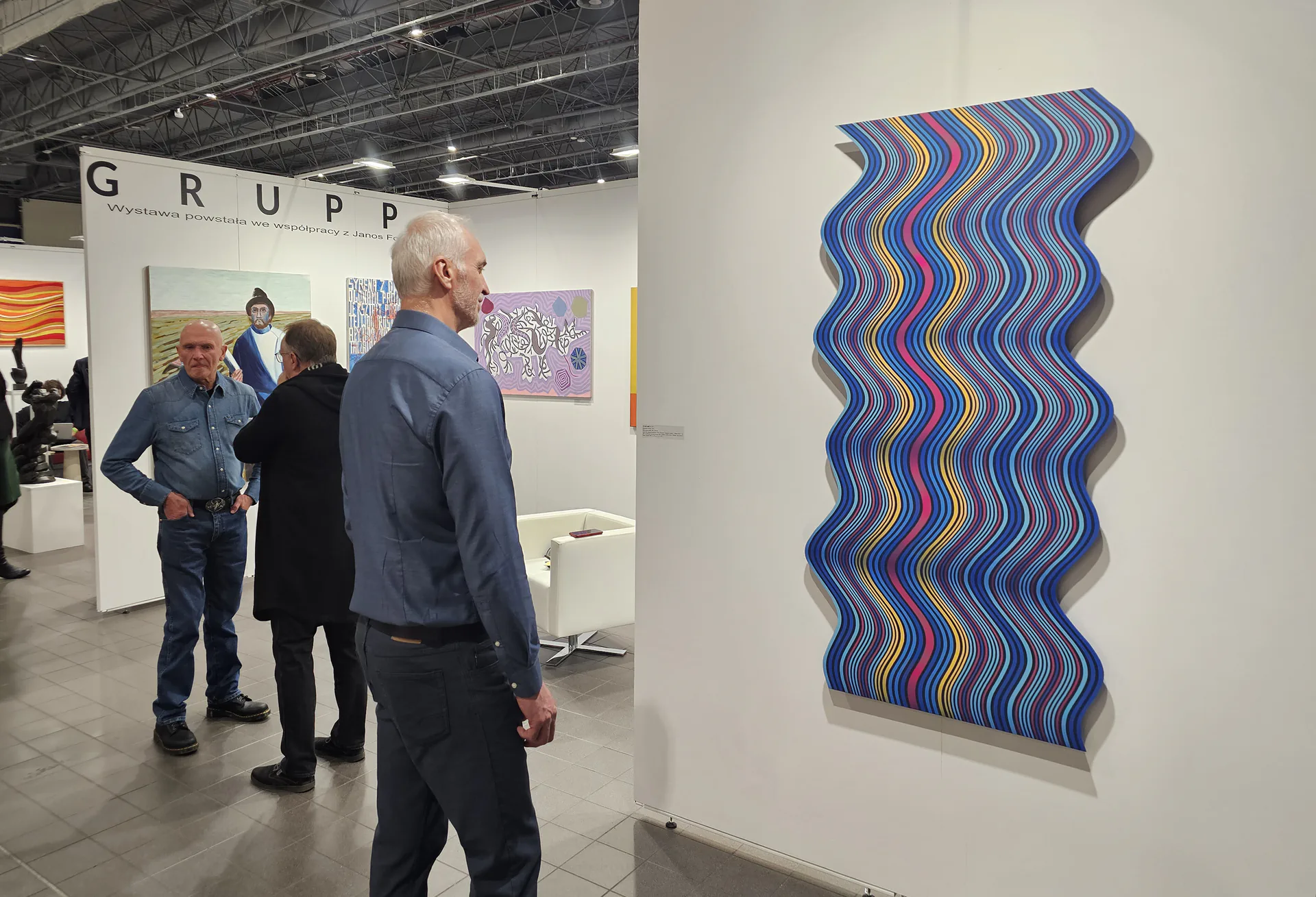 Pi Square exhibition view showing contemporary paintings in a gallery setting
